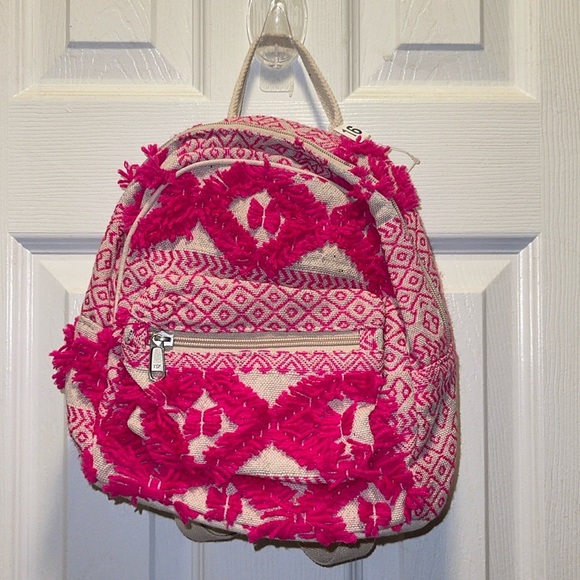 Other - NEW Pink embroidered mini backpack bag with yarn fringe accent NWT